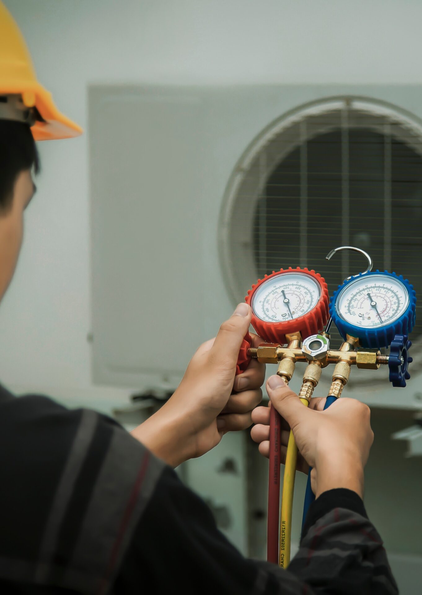 person checking ac unit